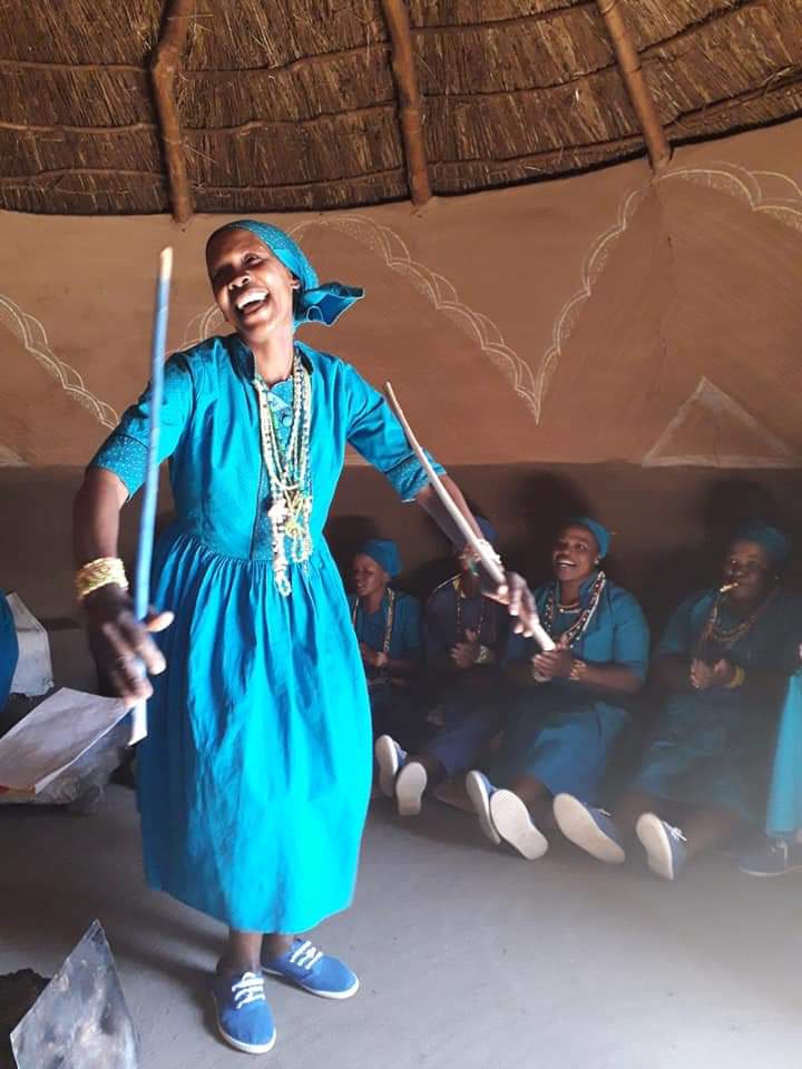Culture, Crafts and Comfort as lady dances in traditional village